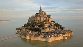 A view of Mont-Saint-Michel from the air at sunrise.