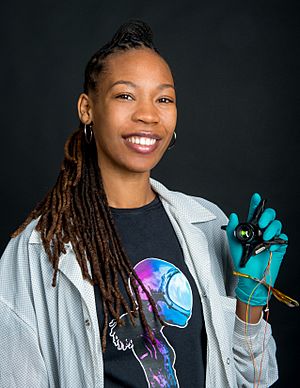 Sabrina Nicole Thompson with CubeSat camera.jpg