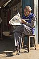 Old man reading news paper early in the morning at Basantapur-IMG 6800