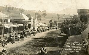 Smith & Tims railway contractors with employees passing through Dungog to Taree