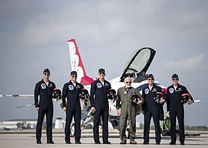 Thunderbirds pilots pose for a photo with Buzz Aldrin