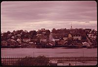LUBEC, LOOKING WEST FROM CAMPOBELLO ISLAND. SMOKE IS FROM MC CURDY'S PACKING PLANT WHERE HERRING IS SMOKED - NARA - 550322