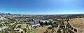 Aerial panorama of Royal Park. The Melbourne skyline sits on the left of the horizon