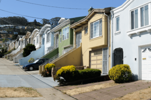 Row houses in Crocker Amazon district, with Daly City's Southern Hills neighborhood in the background