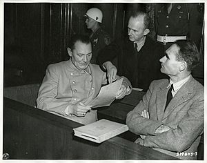 Defendants Göring, Dönitz, and Hess conferring Nuremberg Trials