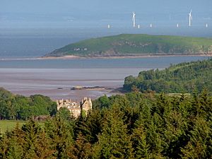 Orchardton House with Hestan and Windfarm - geograph.org.uk - 1344421.jpg