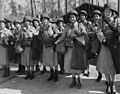 Red Cross workers assembled at the IP, Avenue C and 7th Street, Camp Patrick Henry, left to right, front row, are... - NARA - 542170