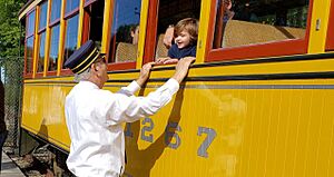 Seashore Trolley Museum volunteer greets child
