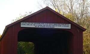 Sign on Red Covered Bridge