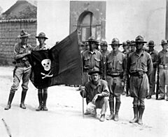 U.S. Marines holding Sandino's Flag - Nicaragua 1932