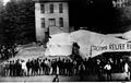 Aftermath of Seattle fire of June 6, 1889, showing bread line leading to tent of Tacoma Relief Bureau (CURTIS 533)