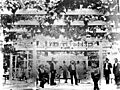 Group of men standing under an arbor at Washington Gardens, Los Angeles (CHS-2875)