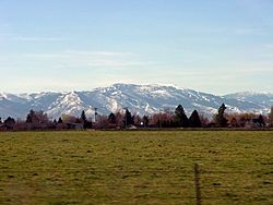 An image taken from Heyburn, Idaho, looking South towards the Albion Mountains surrounding Albion, Idaho