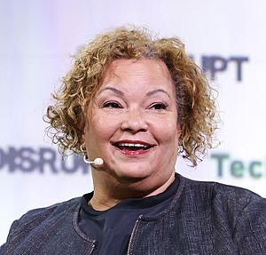 Portrait crop of Apple VP Lisa Jackson speaking at tech conference in 2023