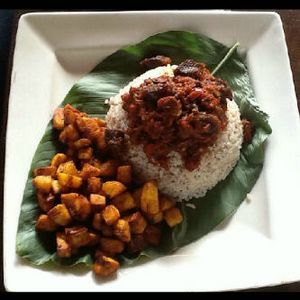 Ofada rise with fried plantain and beaf