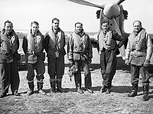 Pilots of No. 43 Squadron RAF at Wick, standing in front of one of the unit's Hawker Hurricanes, April 1940. CH83