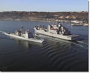 USNS Sacagawea passing USS Mobile Bay (CG-53) in the entrance to San Diego Bay
