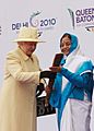 The President, Smt. Pratibha Devisingh Patil receiving the Baton from the Queen Elizabeth II, for Baton relay of XIX Commonwealth Games 2010, at Buckingham Palace, in London on October 29, 2009