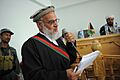 The prosecuting attorney making a statement during a public criminal trial at the courthouse in Asadabad