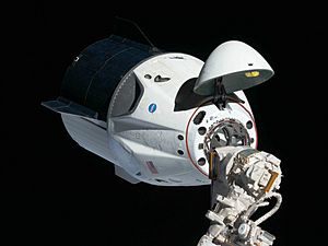 Crew Dragon at the ISS for Demo Mission 1 (cropped)