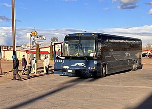 Greyhound bus in Holbrook, AZ by Route 66 Motel - 2023-3-16