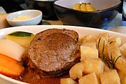 Grilled beef tenderloin with port wine sauce, roasted rosemary potatoes, carrots and zuchini.jpg