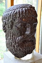 Head of Zeus or Poseidon. Roman copy, c. 320-330 CE of 5th century BCE Greek bronze. Porphyry. The Burrell Collection, Glasgow, UK