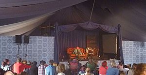 Cainer on stage at the 2013 Latitude Festival