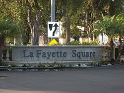 The LaFayette Square neighborhood sign at St. Charles Place, around 2015