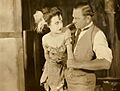 Bessie Love and Wallace Beery in scene from Dynamite Smith (1924)