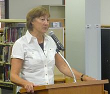 picture of Sharon Creech giving a talk at a school