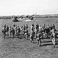 Crews rush to their 3.7-inch guns, 127th Heavy Anti-Aircraft Regiment, Southwold, Suffolk, 9 October 1944. H40434
