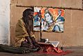 Sadhu and a picture of Siva