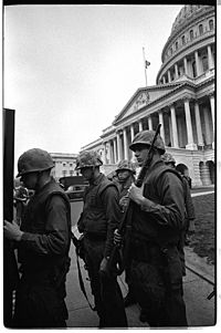 United States soldiers guard the Capitol during the King assination riots