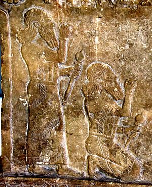 Detail. Assyrian king Tukulti-Ninurta I stands and kneels, 13th century BCE. From Assur, Iraq. Pergamon Museum.jpg