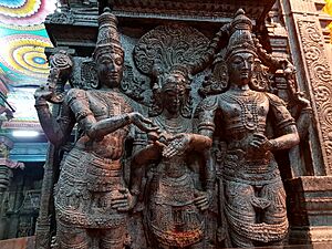 Mariage of Shiva and Parvati (Meenakshi) witnessed by Vishnu, Meenakshi Temple, Madurai (2) (36857653813)
