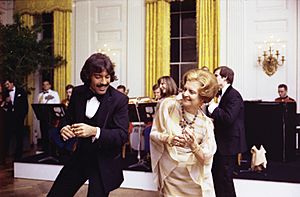 Singer Tony Orlando and First Lady Betty Ford Dancing following a State Dinner Honoring President Kekkonen of Finland - NARA - 12007060