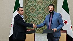 Ahmed al-Sharaa and Mazloum Abdi