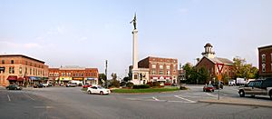 Downtown Angola's traffic circle, "the Mound", with a Civil War monument.  The building with the cupola is the county courthouse.