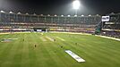 Barsapara Cricket Stadium match under floodlights.jpg