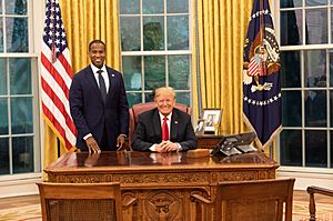 Donald Trump, with John Edward James, Oval Office (September 2018)
