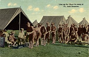 Line up for chow in camp at Fort Sam Houston