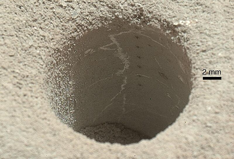 PIA17594-MarsCuriosityRover-JohKleinMudstoneDrillHole-20130510