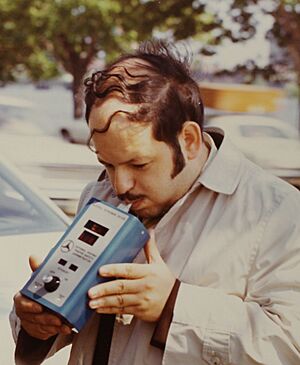 Transportation Systems Center Staff Member Demonstrates Alcohol Breath Analyzer - NARA - 6882631 (cropped)