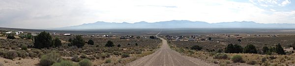 2014-08-09 09 34 30 Panorama of Cherry Creek, Nevada from White Pine County Route 21 just to the west, looking east, with former Nevada State Route 489 (Cherry Creek Road)-cropped