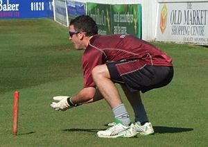 Kieswetter crouched down ready to catch a ball during training