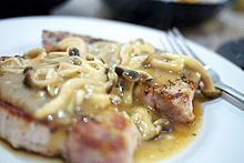 Grilled pork with mushroom sauce