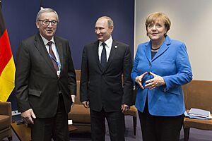 Jean-Claude Juncker, Vladimir Putin and Angela Merkel at COP26