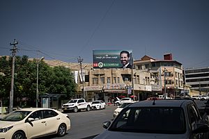 View of a Qubad Talabani billboard over Duhok city