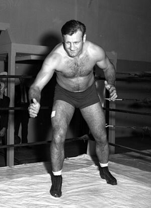 Bronko Nagurski posing in ring